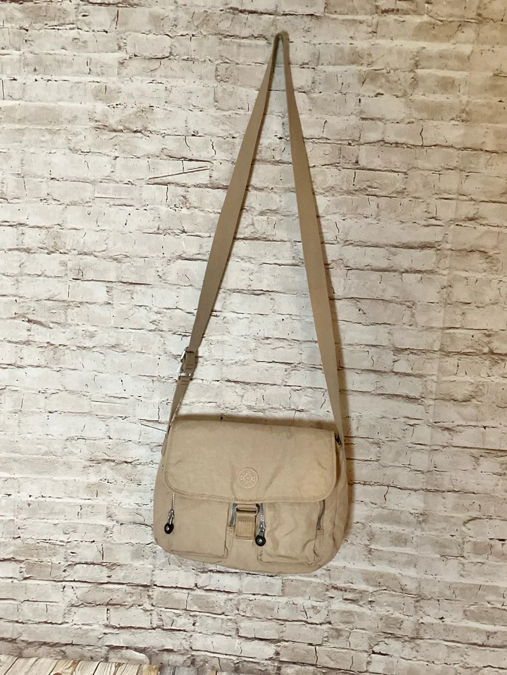 the Kipling tan Rita Messenger crossbody bag